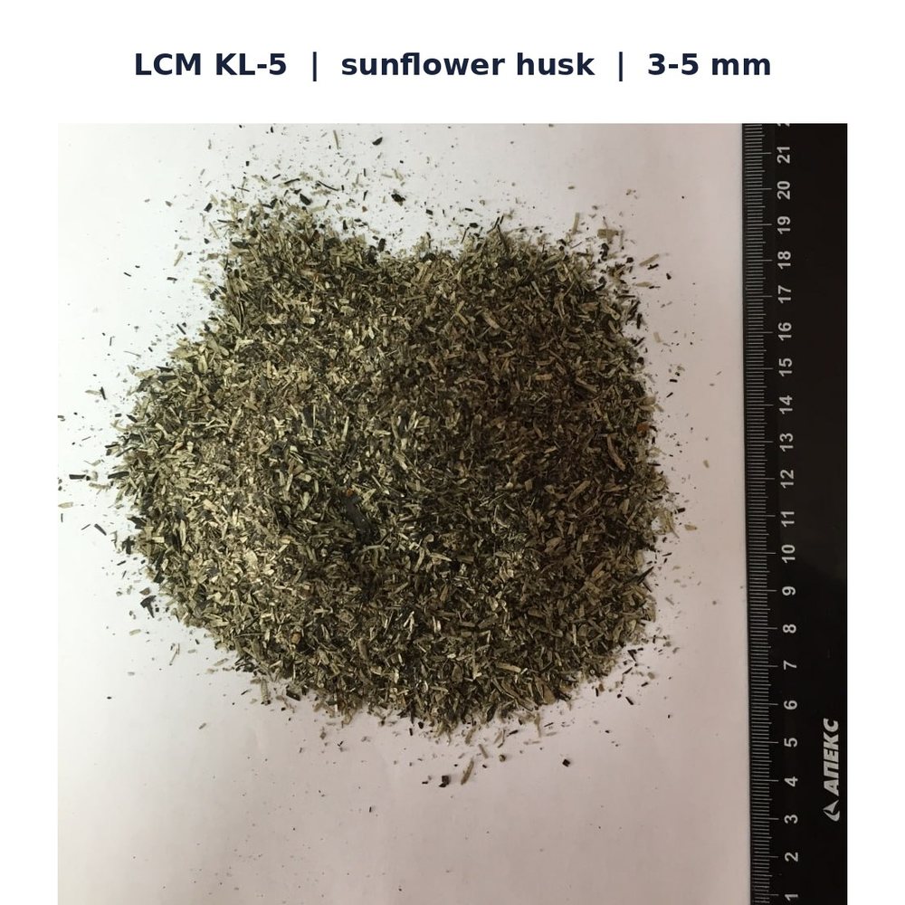 BPMD LCM grade KL-5 from sunflower husk, particle size 3 to 5 mm, with ruler for scale